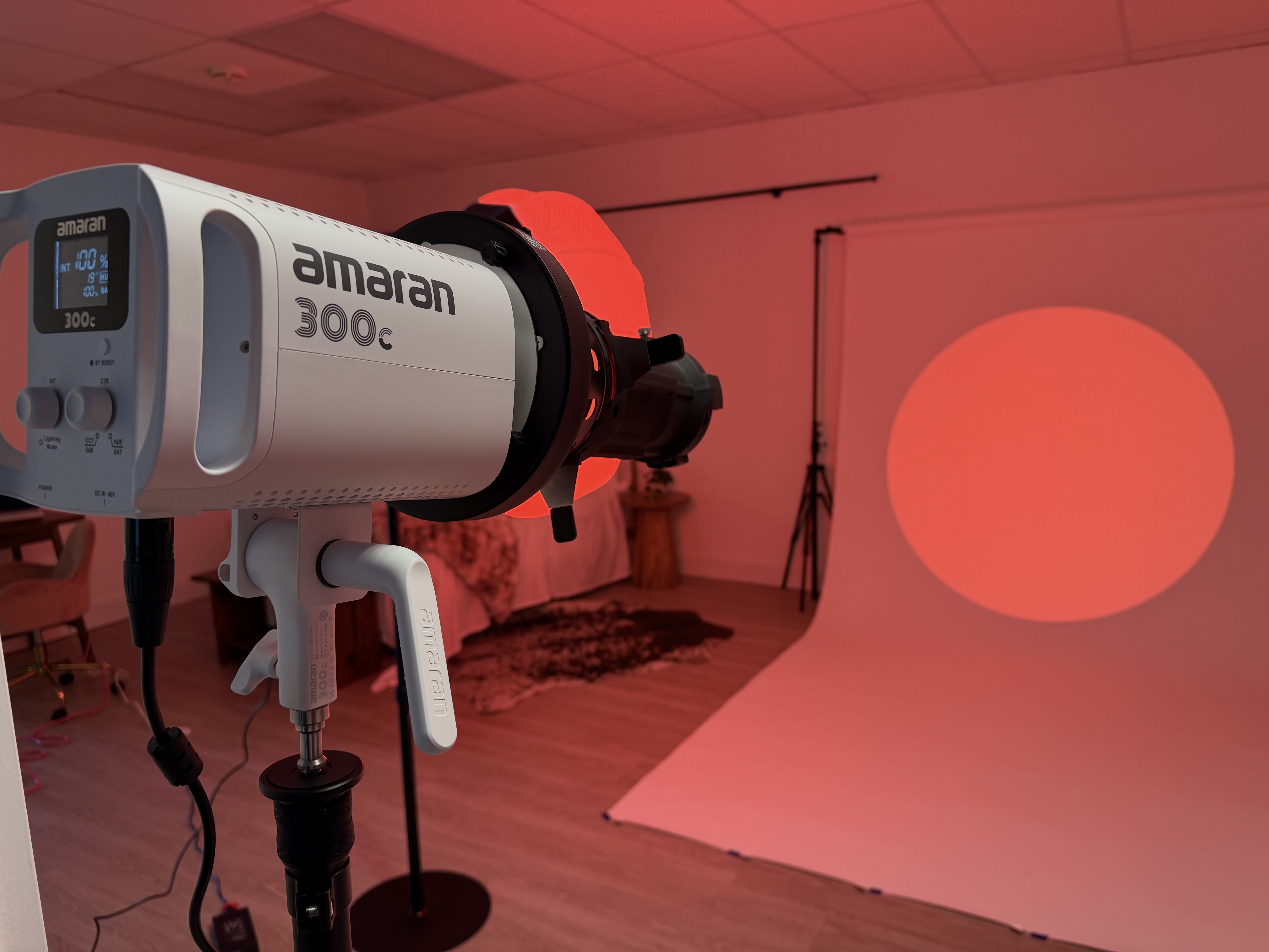 Amaran 300c studio light with colored lighting in studio